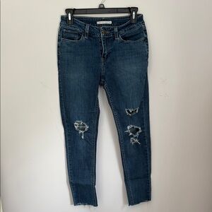 Levi’s 535 Super Skinny Distressed Jeans